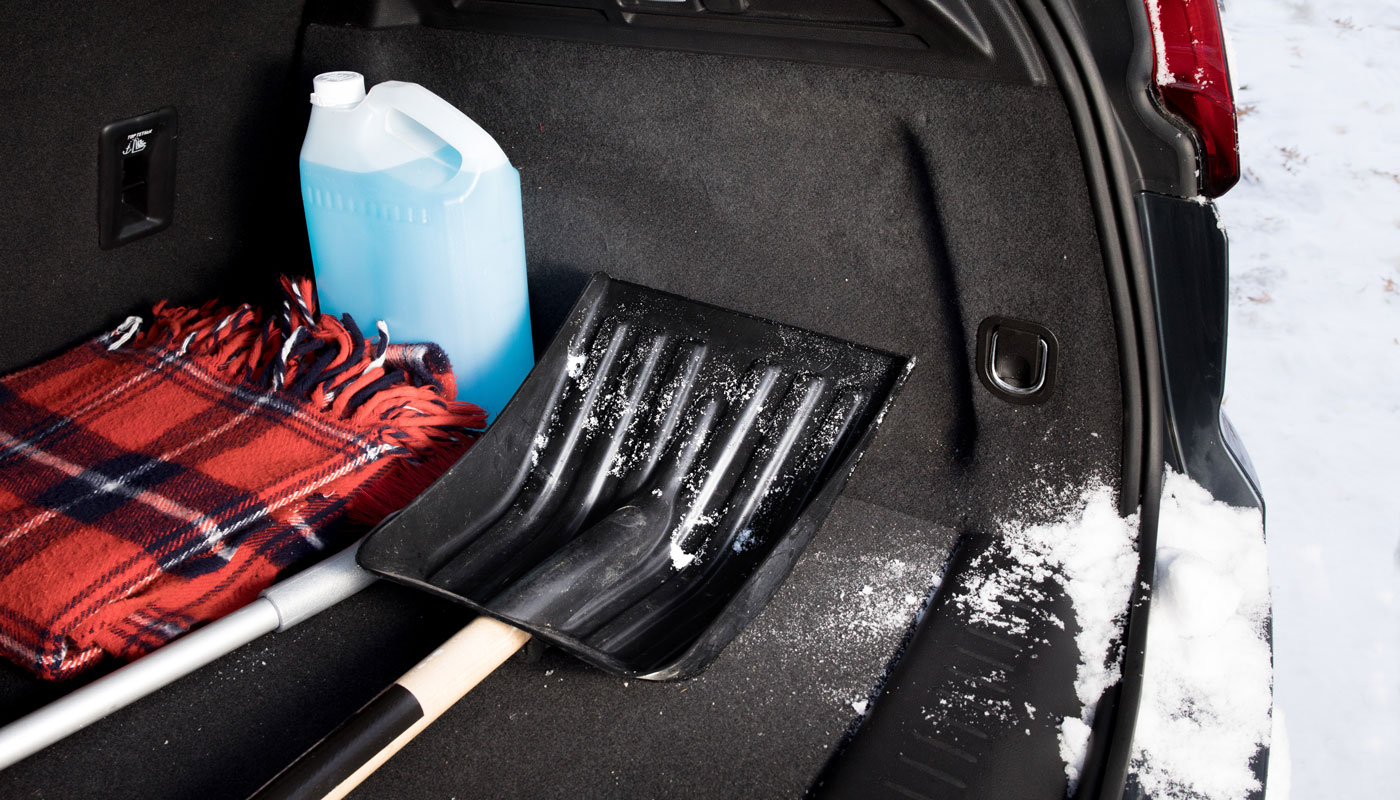 winter driving safety - an emergency snow shovel in the trunk