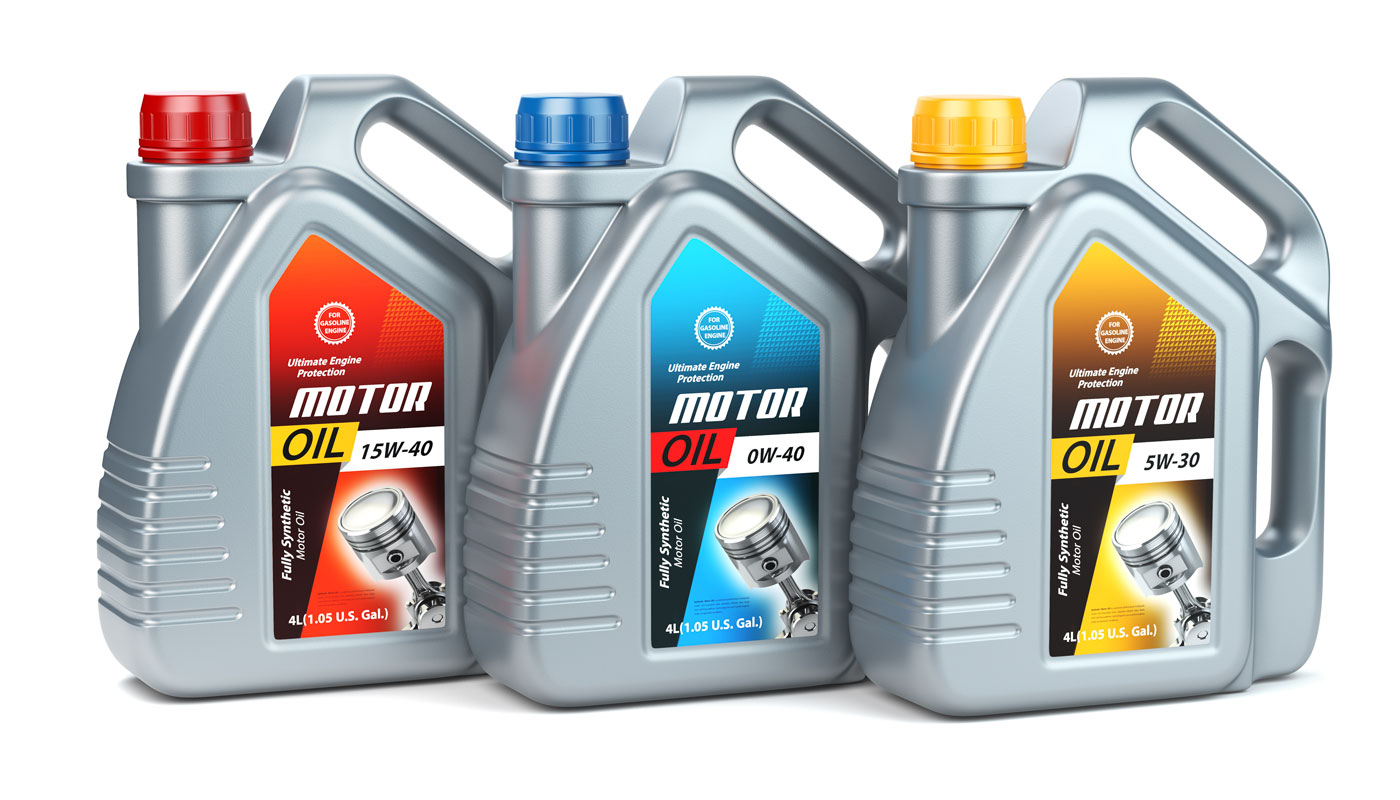 Plastic motor oil canisters with different types of motor oil