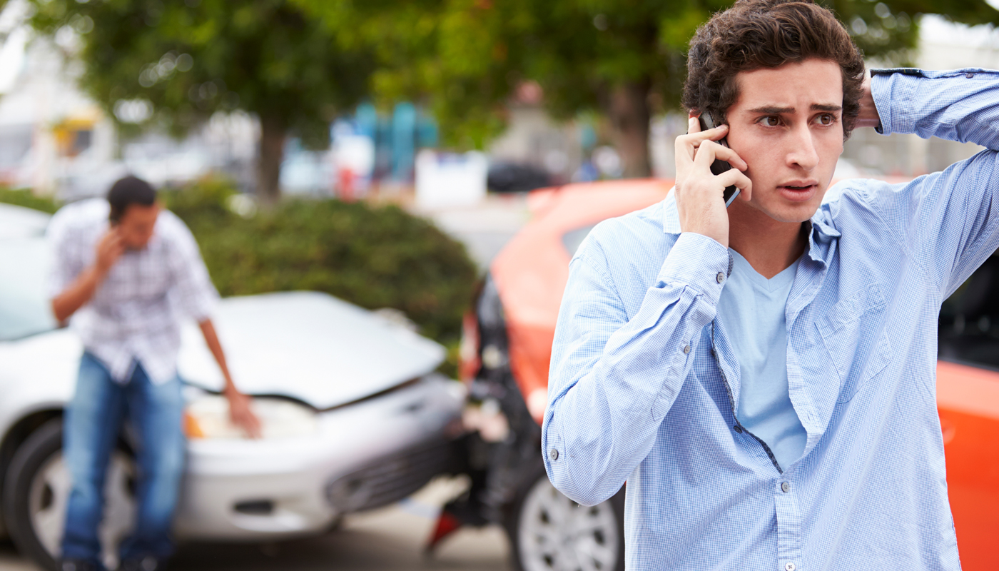 Driver Making Phone Call After Traffic Accident