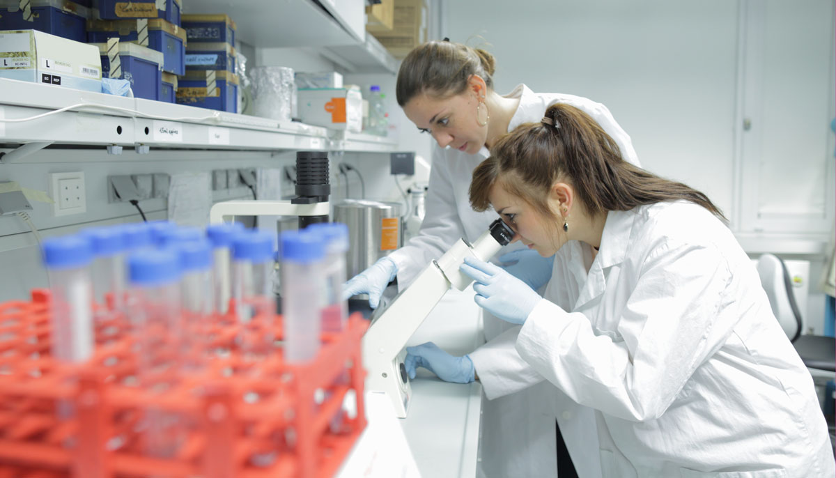 Two women scientists working in a lab