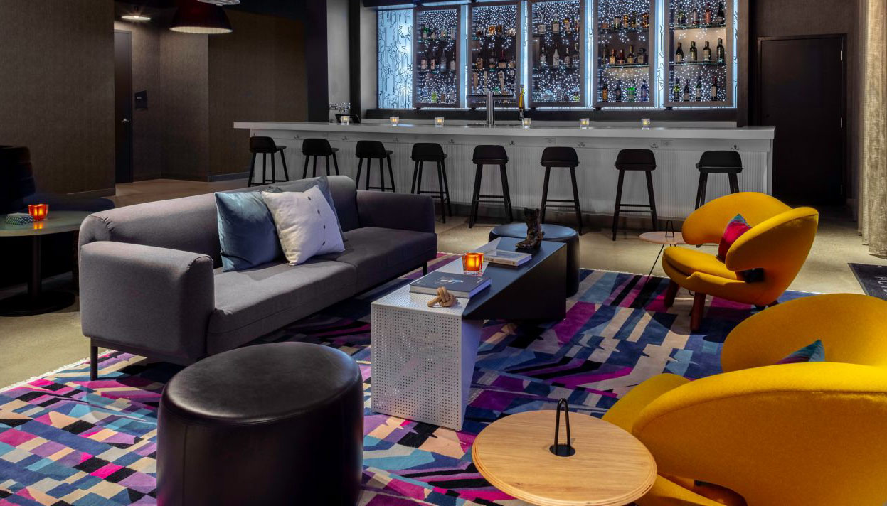 Inside lounge and bar area of the Aloft Nashville Airport hotel.