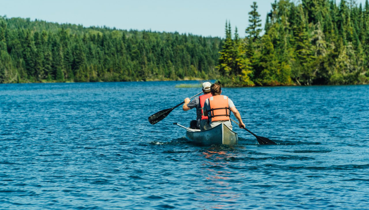 Two people in a canoe in Isle Royale National Park