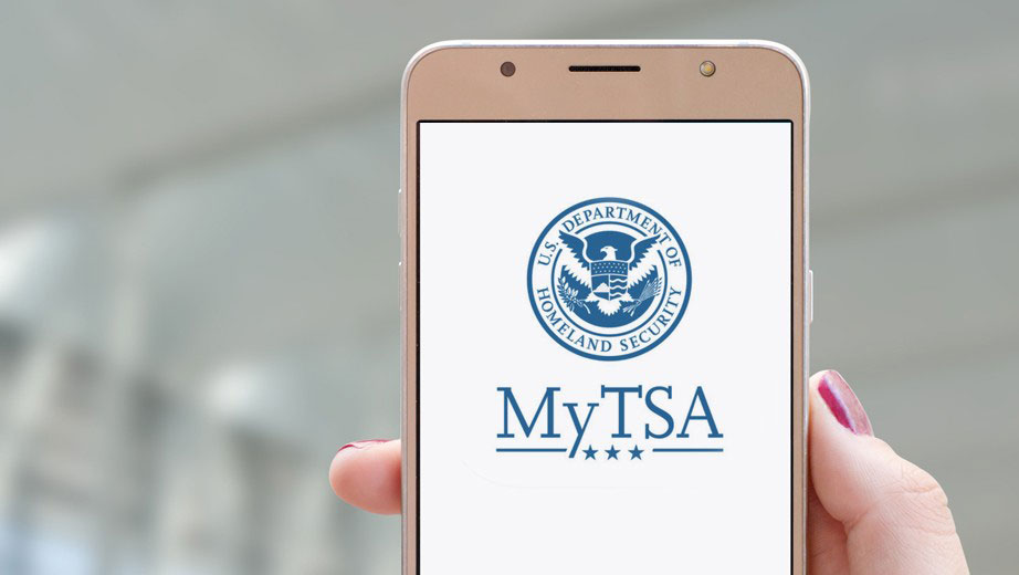 Hand holding smart phone with MyTSA app loaded on screen