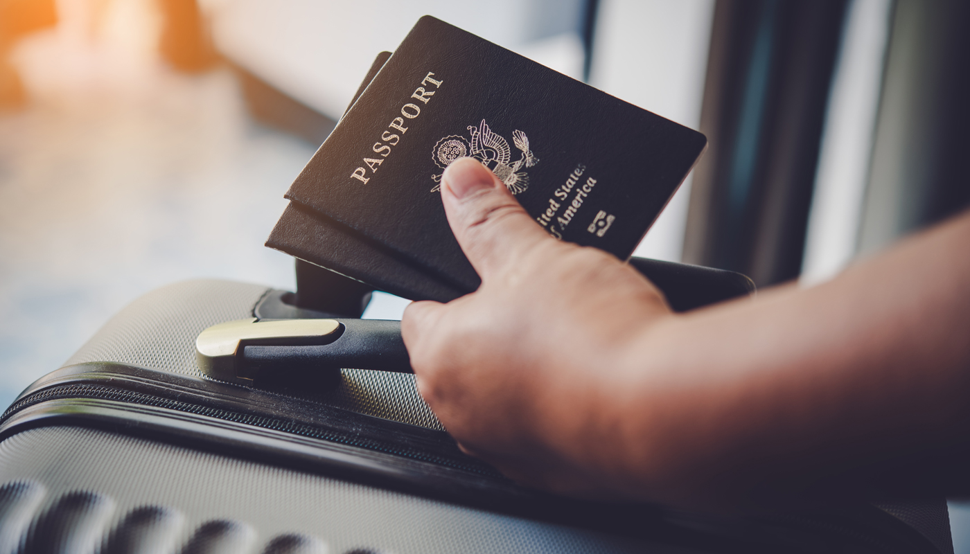 People holding passports, map for travel with luggage for the trip 