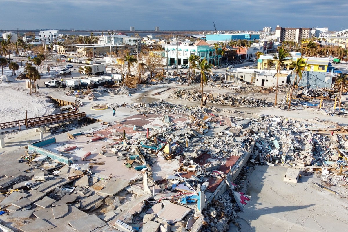 An aerial view of damage to a town after a hurricane.