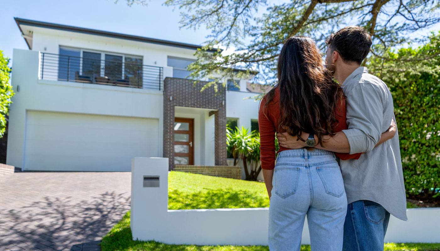 couple looking at house together