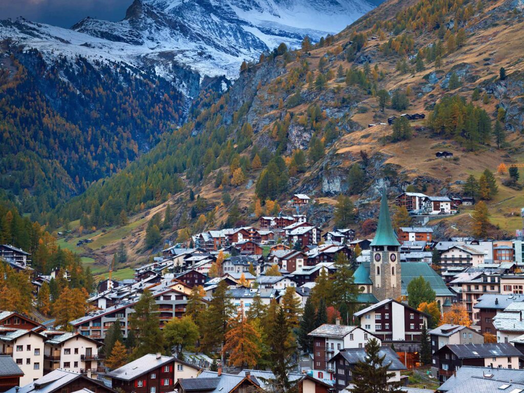 Horses pull sleighs through Zermatt