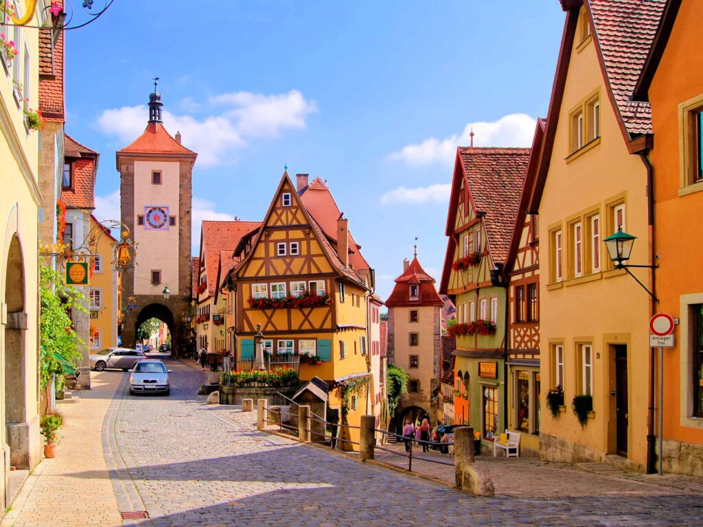 Pass through the ancient walls of Rothenburg ob der Tauber