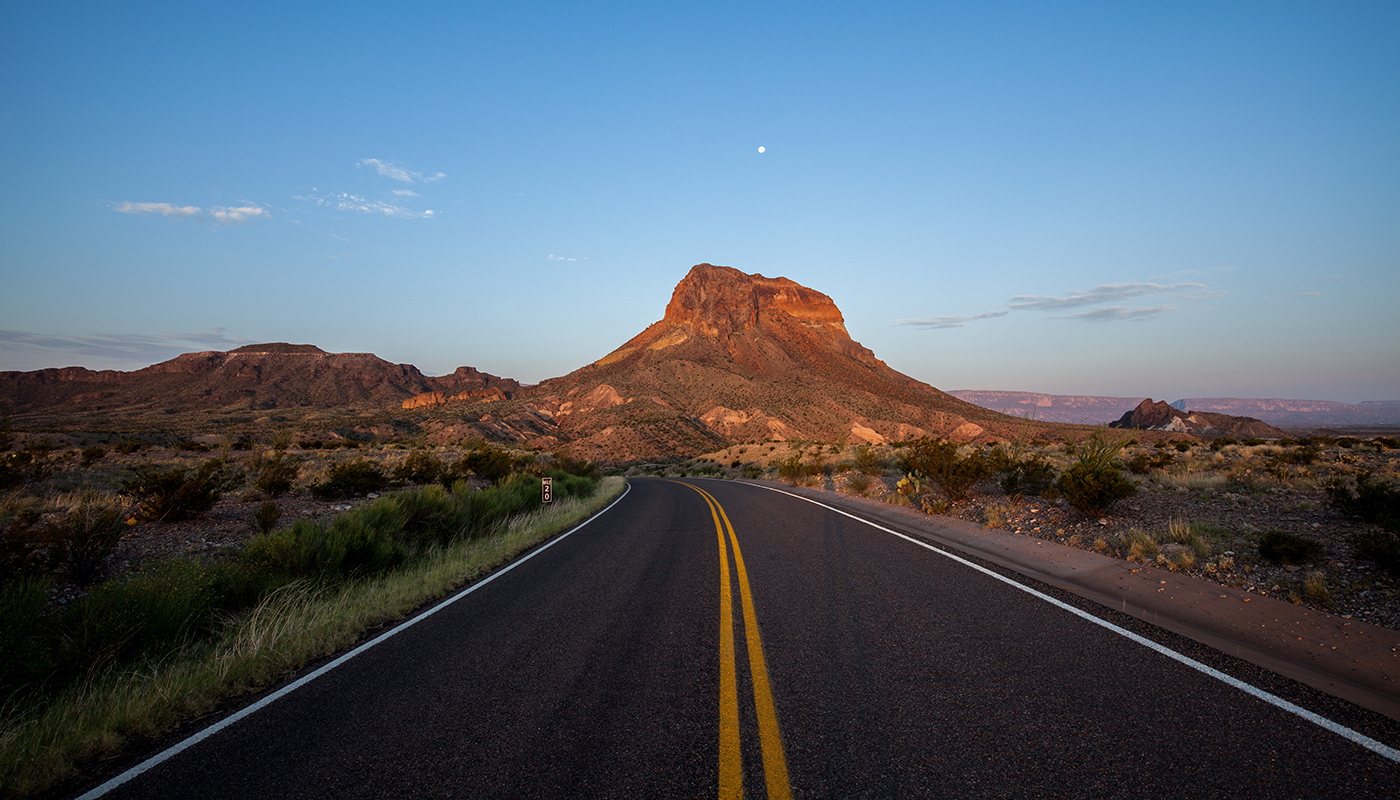 Cerro Castellan as seen from the Ross Maxwell Scenic Drive in the morning. The moon is seen above the mountain.