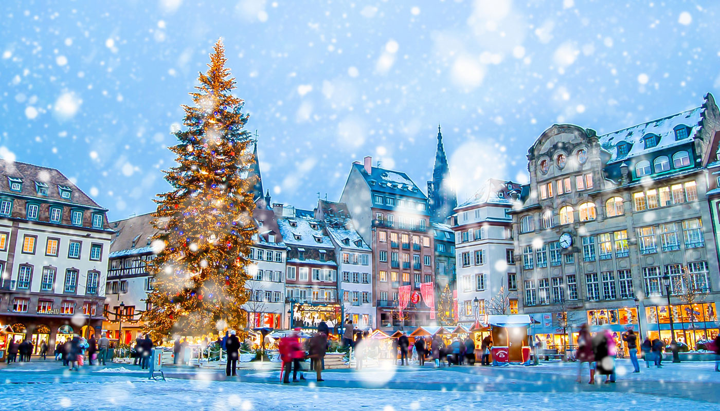 Christmas market under the snow in France, in Strasbourg, Alsace