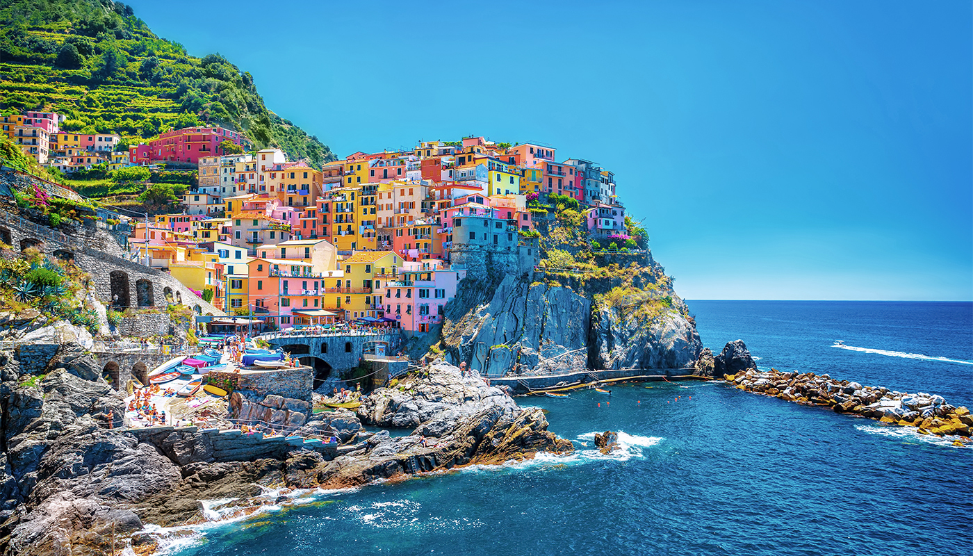 Colorful cityscape of Cinque Terre next to the Mediterranean Sea
