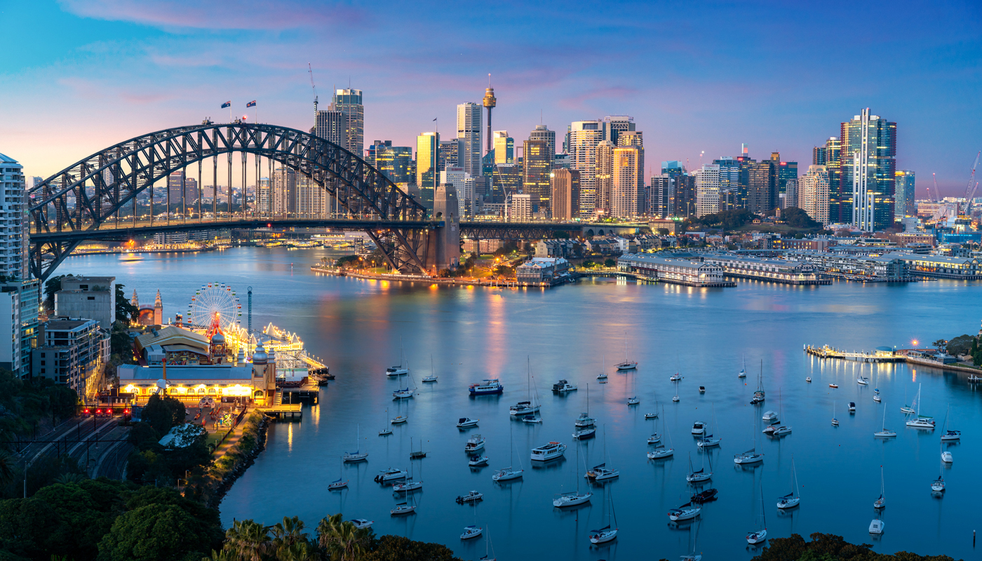 Sydney, Australia with Harbor Bridge and Sydney skyline during sunset