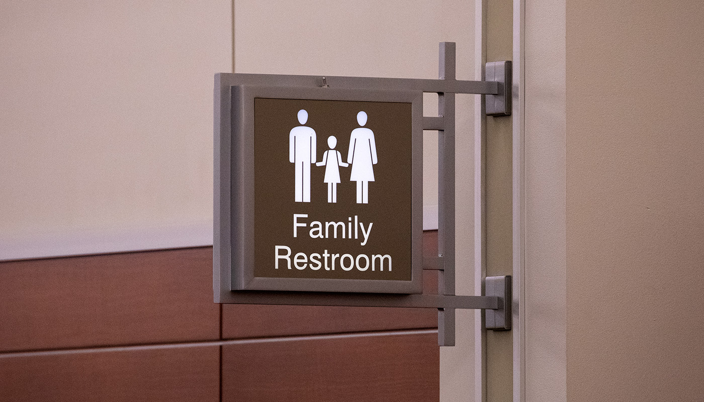 Family Bathroom sign on wall 