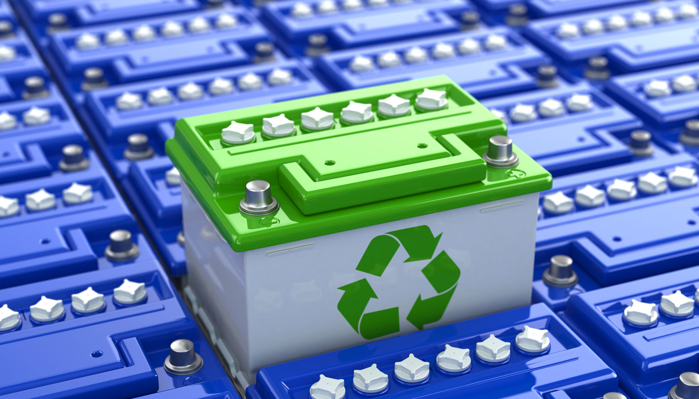 An art concept of a recycled battery showing a "green" battery among "regular" batteries.