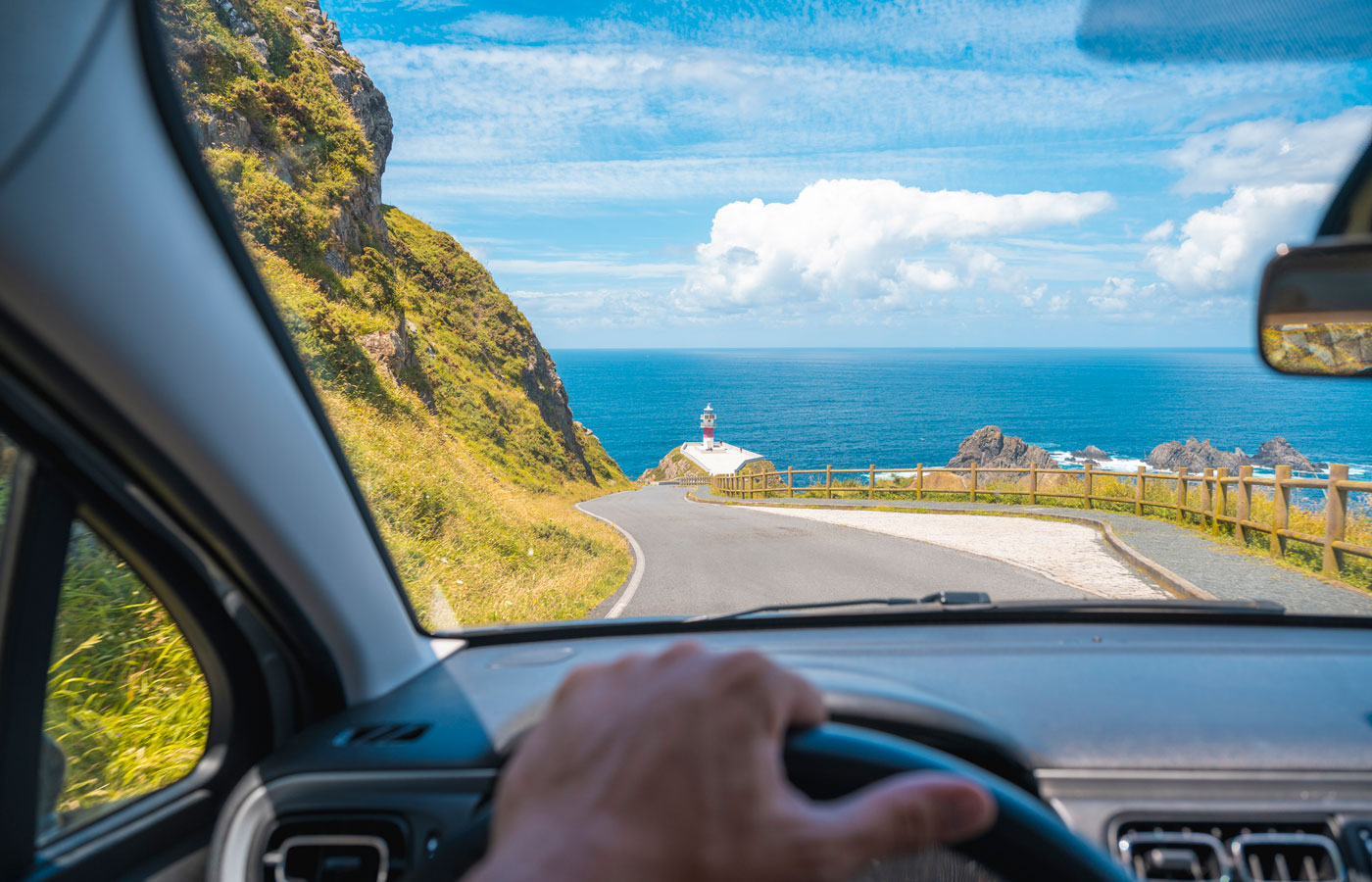 inside view of driver on coastal highway