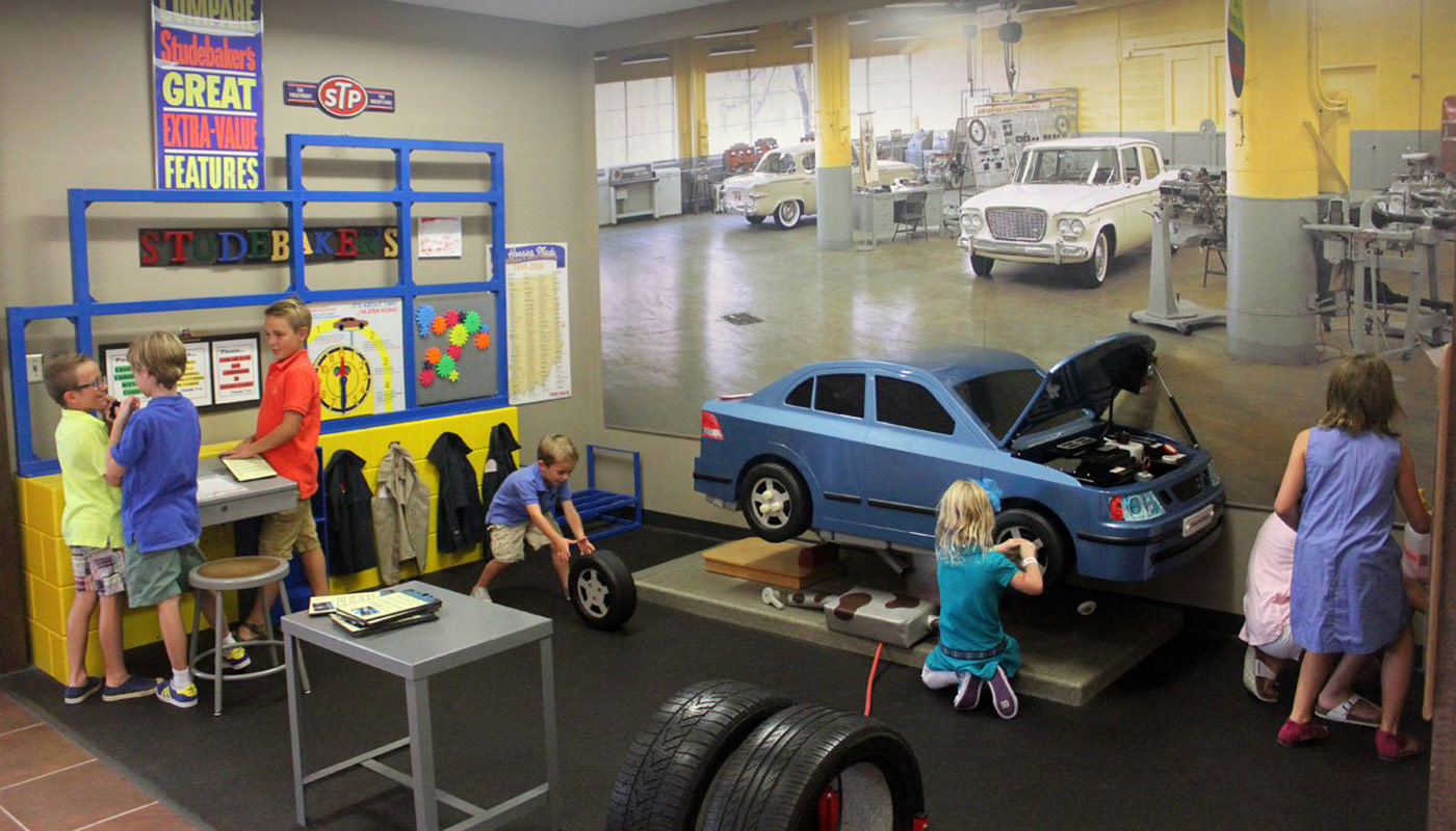 children at play in the area designed for kids at the Studebaker National Museum