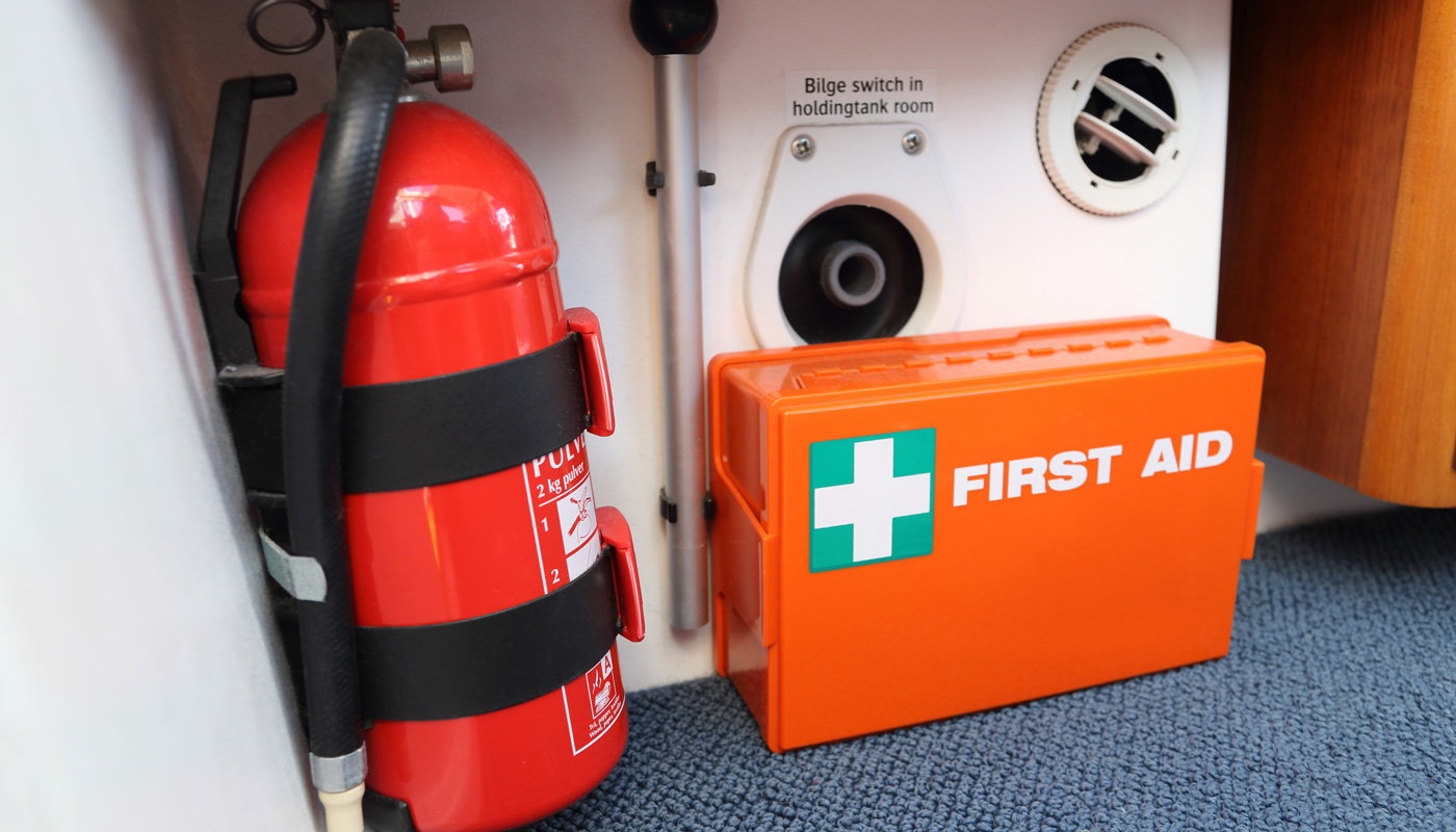 First aid and fire extinquisher on board a boat.