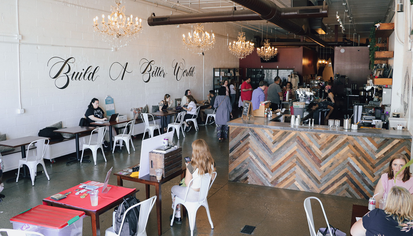 Customers mingle inside Brewpoint Coffee