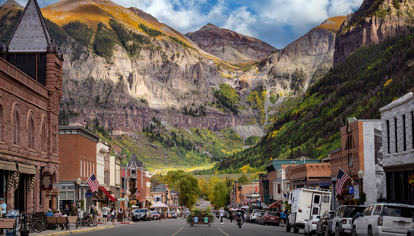 View of street in Telluride, Colorado with mountains in the background