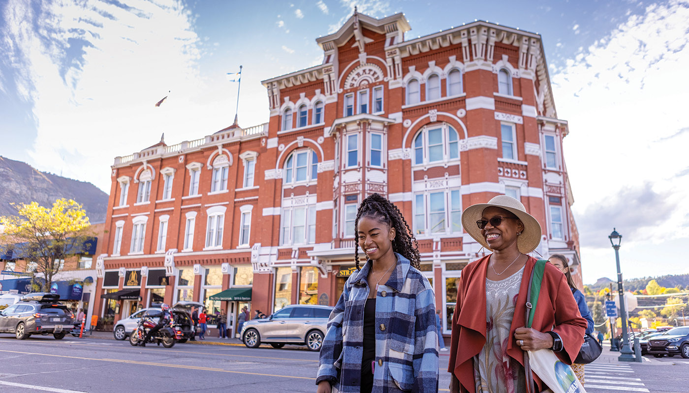 two women walking outside in downtown Durango