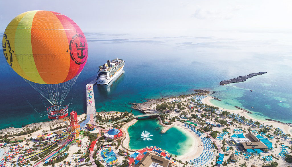Perfect Day at CocoCay, Bahamas, private island, aerial, drone shot of island, Up, Up, and Away balloon aloft on left, lagoon, Daredevil''s Tower, Mariner of the Seas docked at pier below