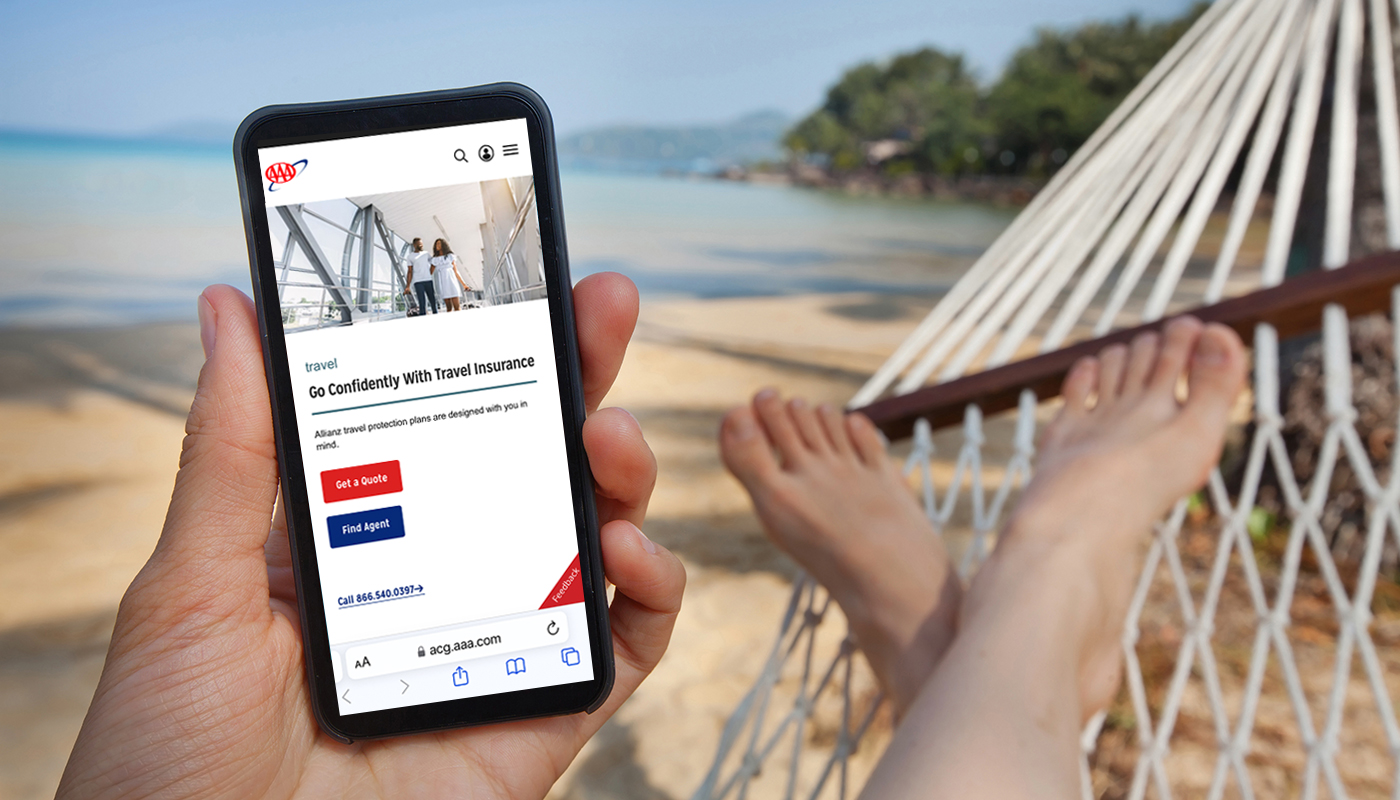 Person in a hammock holding smart phone with AAA travel insurance on the screen