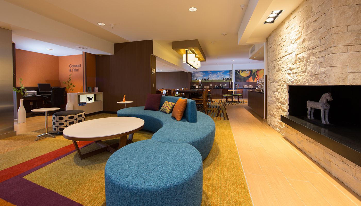 Marriott lobby with large seating area and fireplace