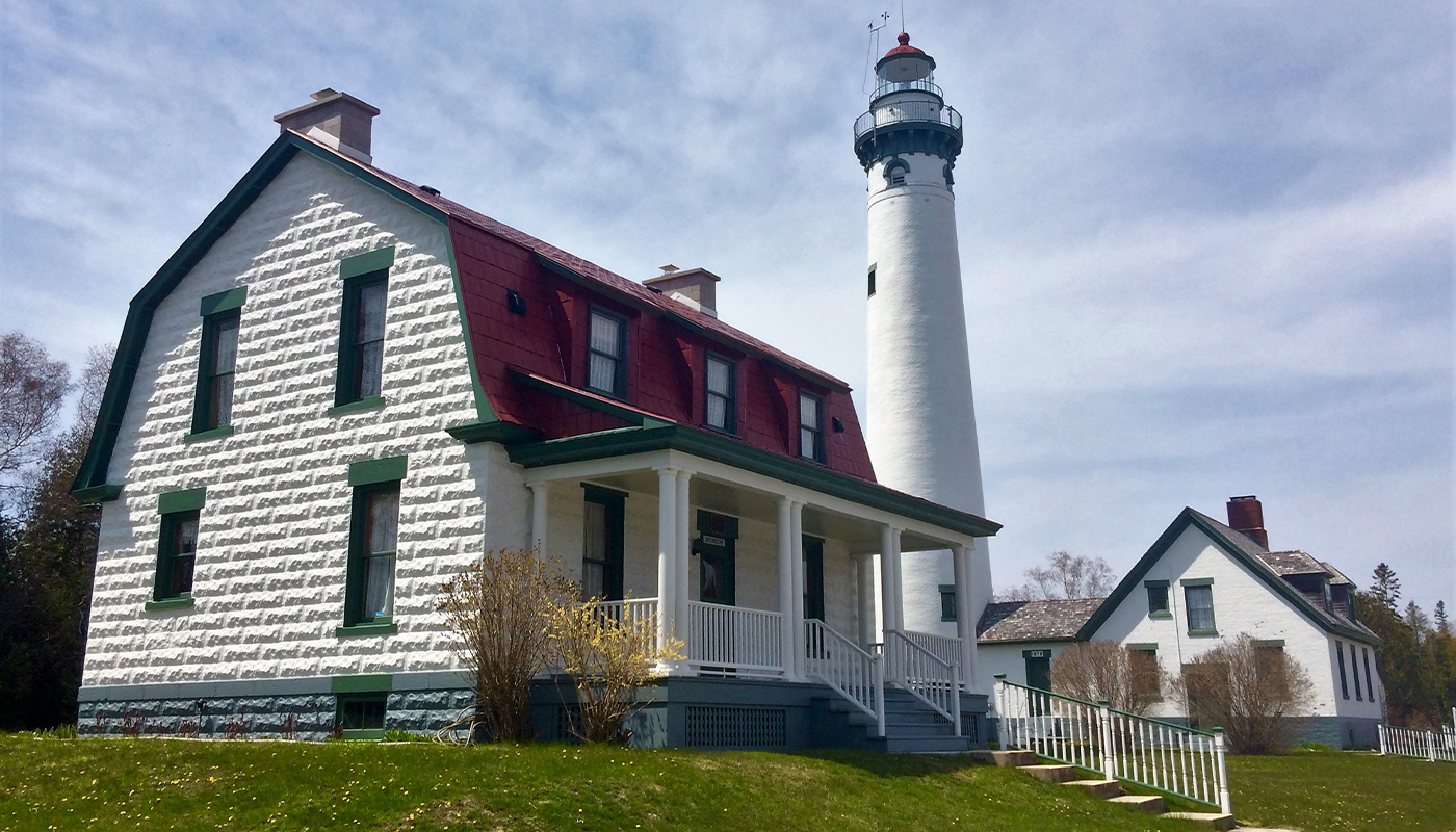 Presque Isle Township Museum with its lighthouse on the right