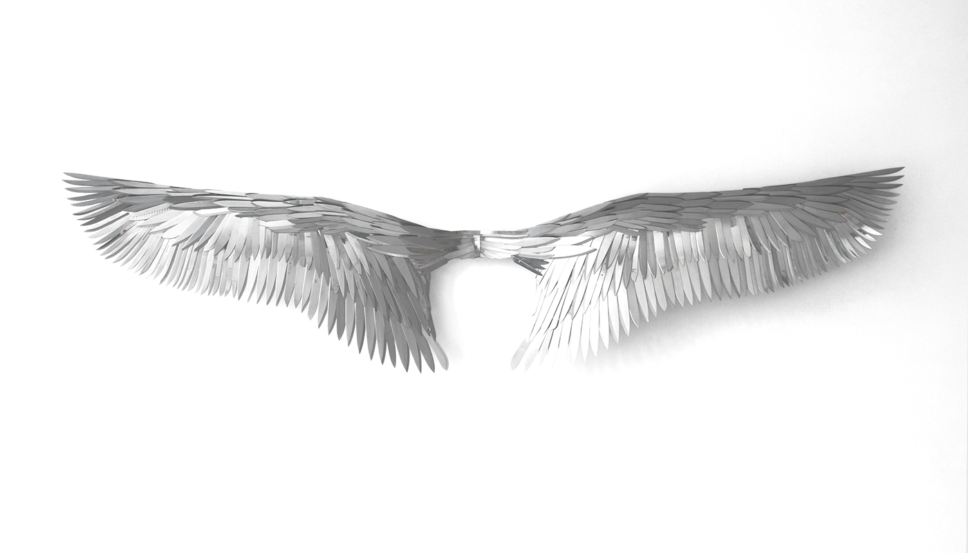 A wings art piece created from table knives by sculptor Paul Villinski.