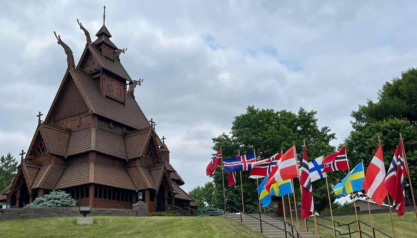 Wooden church and flags at the Scandinavian Heritage Park