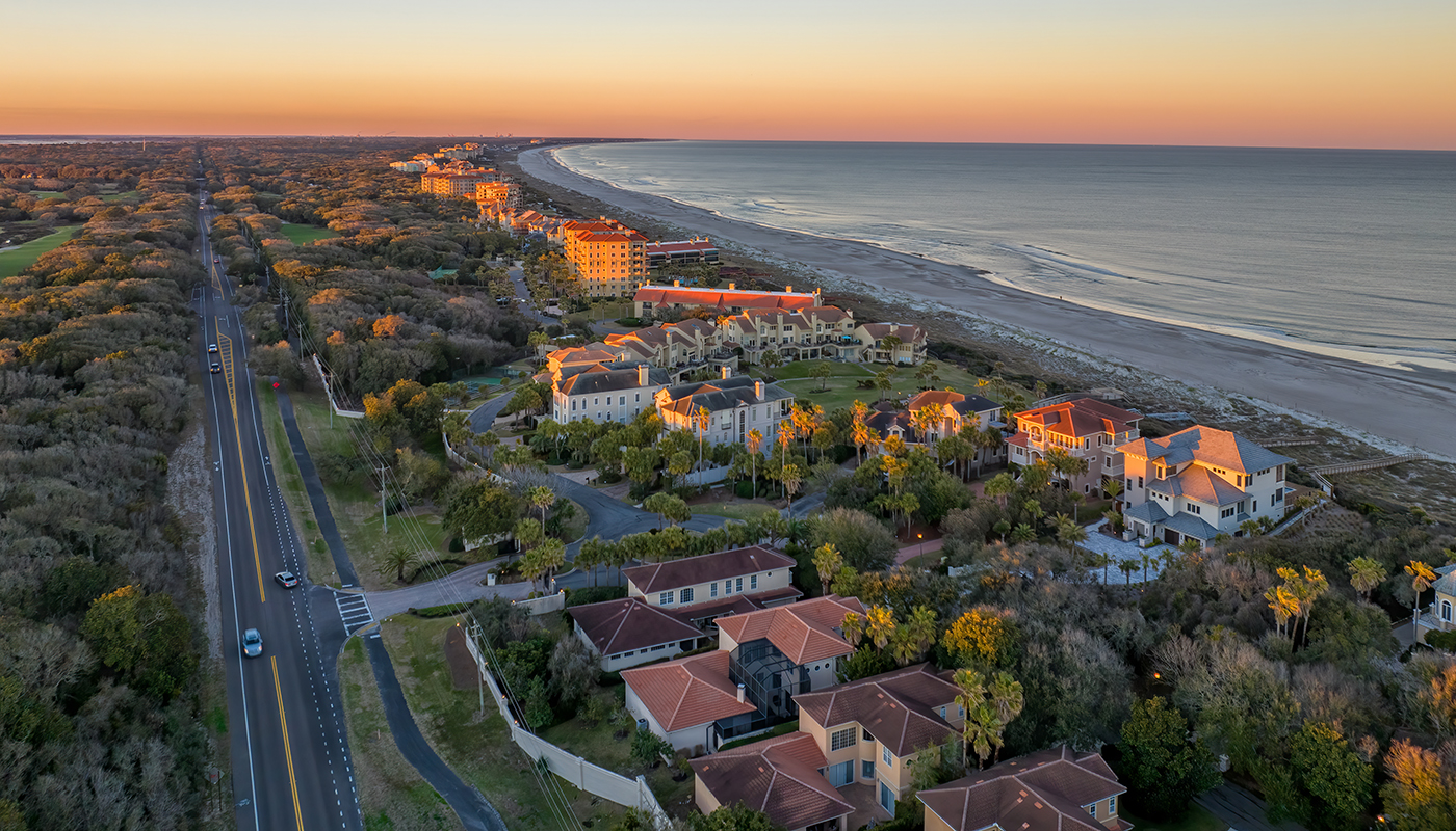 Aerial View of homes, a main road and the water at Fernandina Beach at Sunset, Florida 