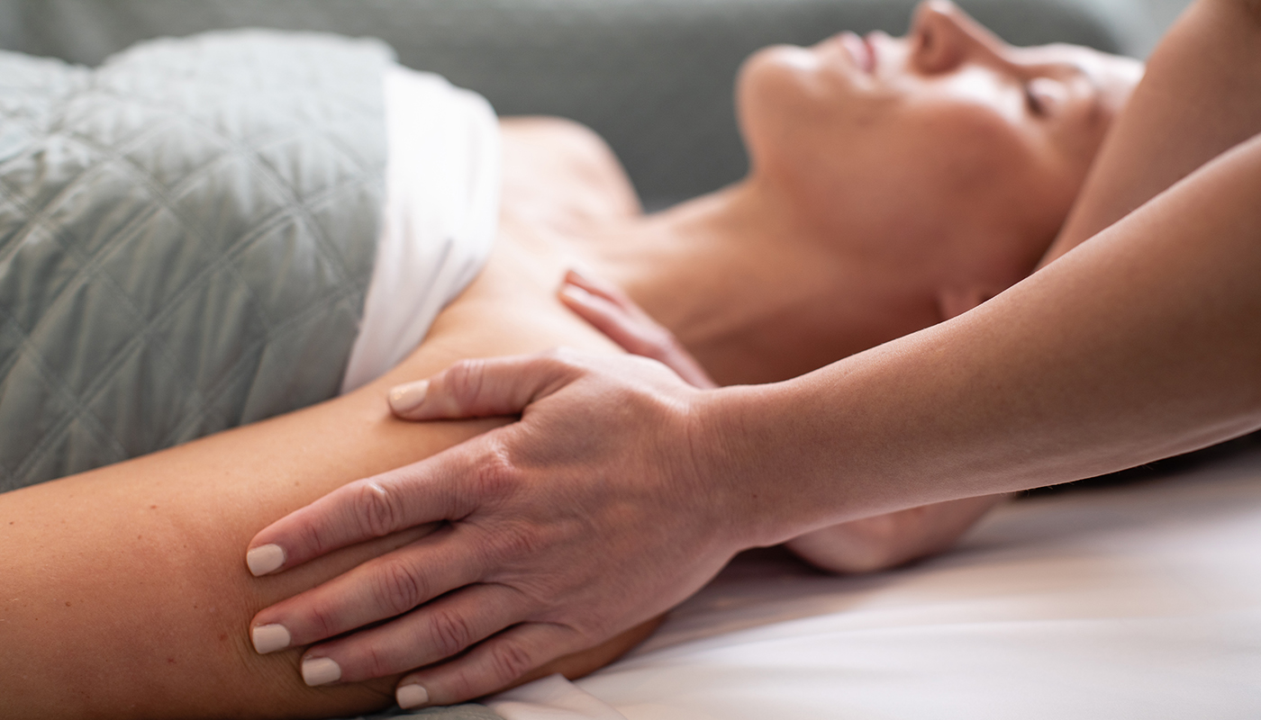 Woman getting a massage while laying down