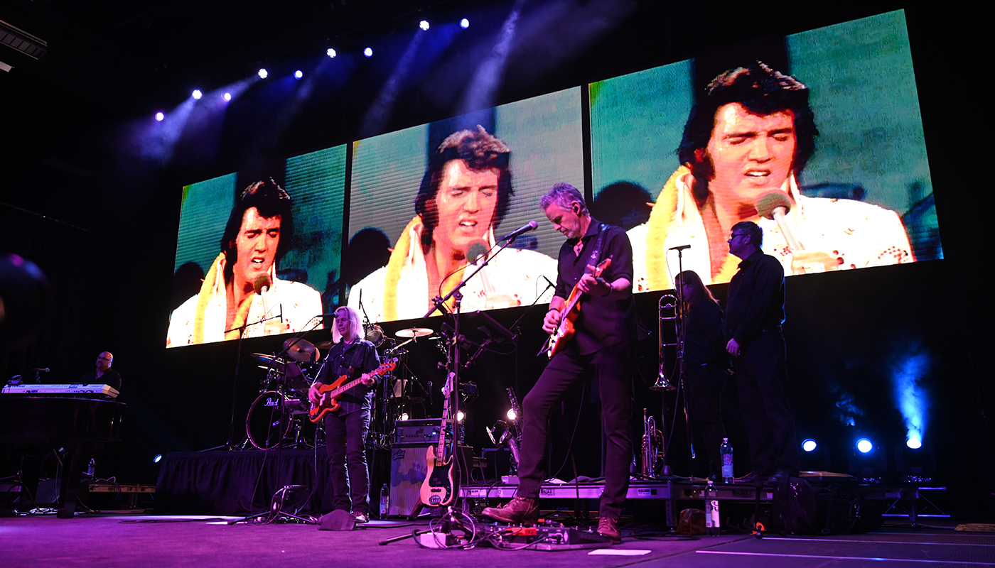 Musicians play on stage at Graceland during Elvis Week celebrations.