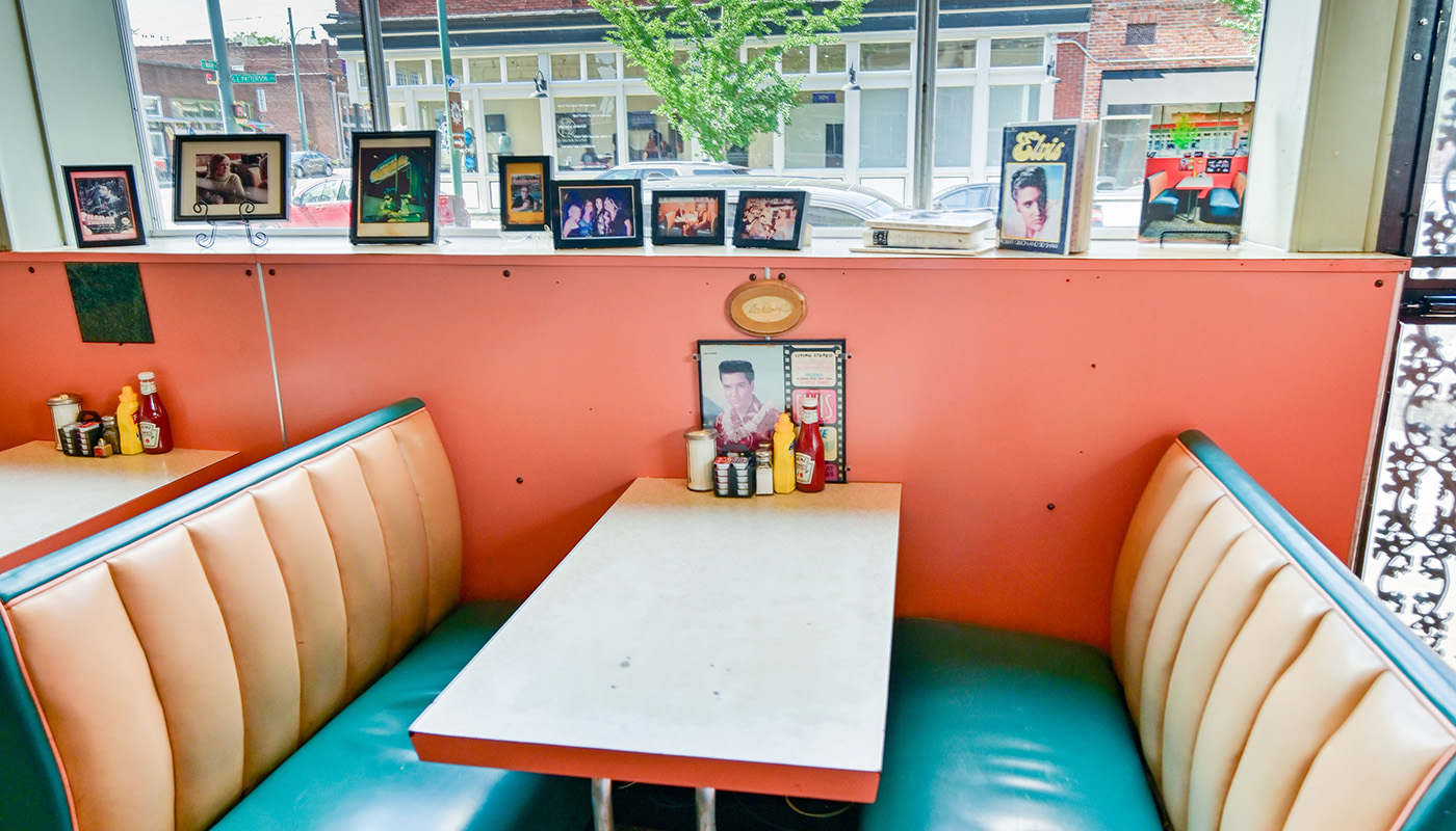 Empty booth with various Elvis Presley memorabilia at Arcade Restaurant in Memphis, Tennessee