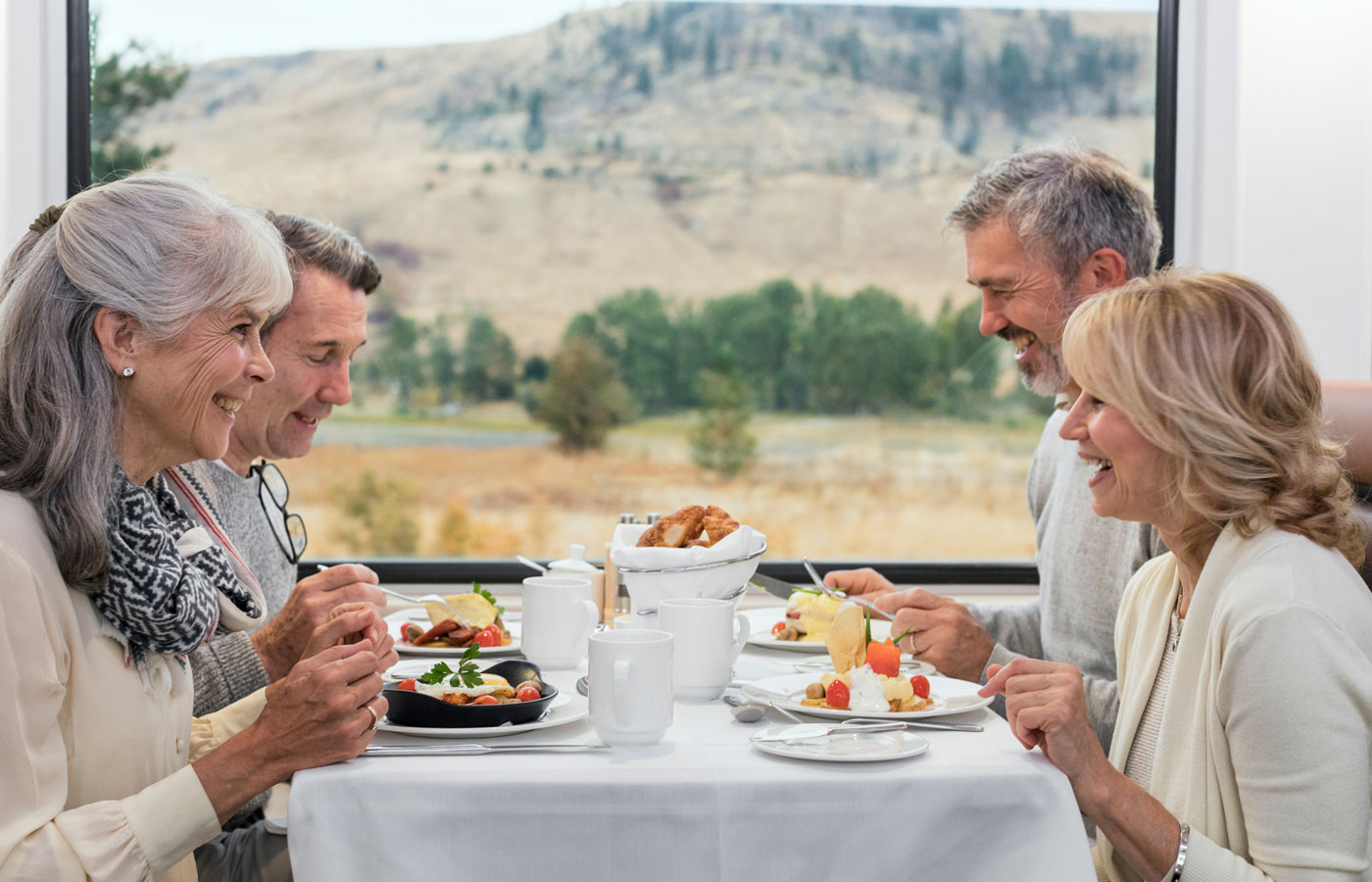 couples enjoying breakfast in Golf Leaf dining room on Rocky Mountaineer