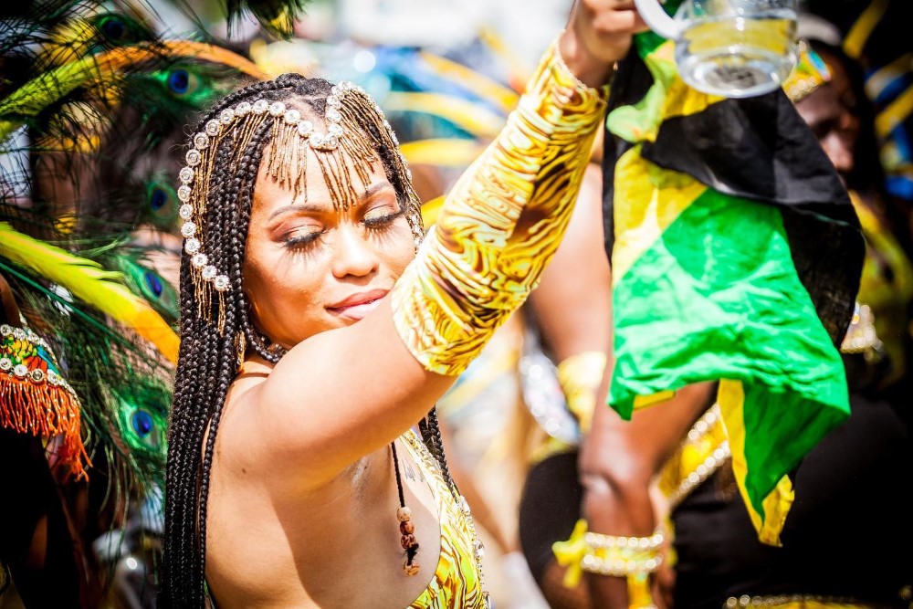 A woman dancing in latin dress at the Orlando Carnival 2023
